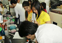 Training in collection of samples for rapid diagnosis of influenza in Thailand
