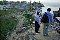 Levees are eroded and farmland is lost as the Jamuna River changes its course (Break in the Chondonbaisha levee at Sariakandi)