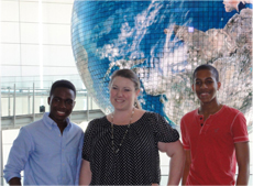 Carlan Ivey, Ms. Amanda Baskett (center), and Larry Jacobs