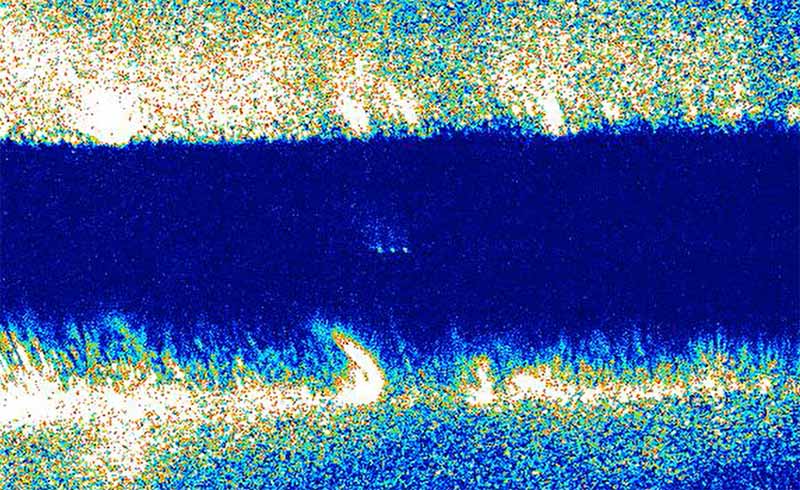 Fig.3 Image of trapped ions in the SLE-made ion trap