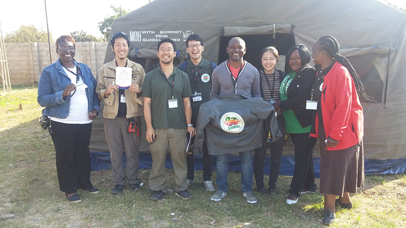 Dr. Hokuto Nakata (second from the left) and other scientists at the research site in Kabwe, Zambia. (Photo: Hokuto Nakata)