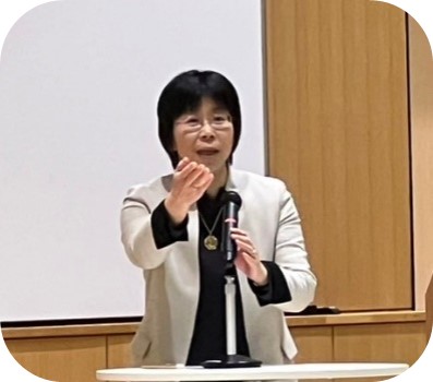 写真：当日の様子「開会挨拶（藤吉尚之審議官）」